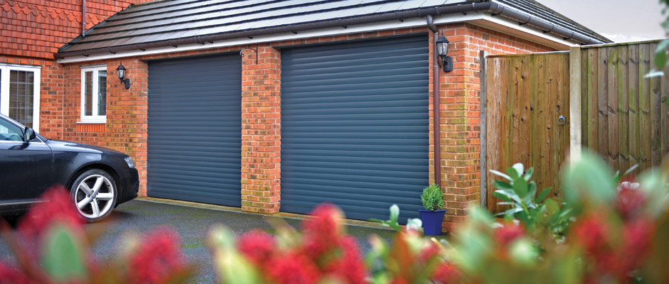 Compact roller garage doors